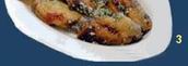 Jawaneh: Chicken wings marinated in garlic.