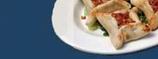 Sfiha: Pie made from our own fresh dough topped with spicy ground lamb meat, onions and tomatoes.