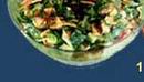 Fattouch: Medley of fresh vegetables served with tangy lemon dressing and topped with crisped bread.