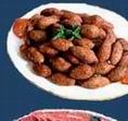 Kebbe Akras Mekli : Ground beef and cracked wheat, stuffed with minced meat, onions and pine nuts.